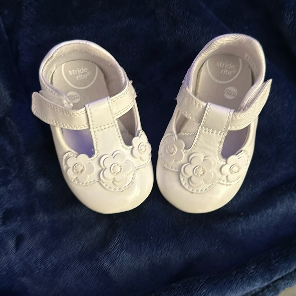 Baby white Mary Jane’s with soft bottom for prewalkers